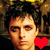A 50x50 pixel animated contact sheet showing two frames of a buddy icon with a person's face and heart symbols changing color between frames.