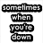 Black and white pixelated text blocks arranged in a with four distinct sections of stylized lettering