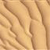 A static image of a textured surface with flowing, curved lines in varying shades of brown and beige, creating a patterned appearance.