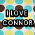 Pixelated text "I LOVE CONNOR" in white block letters on black rectangular backgrounds, set against a patterned backdrop of brown circular shapes and pastel blue-yellow squares.