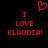 Red pixelated text and heart symbol on black background, with identical text on both sides of the heart.