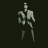 A monochrome animation of a person in a suit performing sequential dance moves against a dark background.