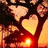 Pixelated image with red text blocks and heart shapes over a dark background with warm light effects.