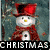 A snowman with a red top hat and scarf stands against a blurred background, below which is the text "CHRISTMAS".
