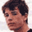 Static 48x48 pixel icon showing a close-up of a person's face with dark curly hair, brown skin tone, and neutral expression against white background.