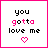 Two side-by-side pixelated display the text 'you gotta love me' with a heart symbol below, where the left shows a pink heart and the right shows a black heart