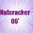 A pixelated image with a purple gradient background displaying the text "Nutcracker 06" and a golden ballet slipper on blue.