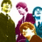 Pixelated image of four figures in suits with text 'the beatles' at bottom, featuring repeated color schemes and character arrangements.