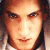 A pixelated image of a person's face on the left, with a gray star and text 'I love Eminem!' on the right.