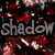 Pixelated image with dark background and red splatter effects, featuring the word 'shadow' in large gray letters.