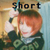 A person with short reddish-brown hair appears in multiple poses: holding a drumstick, raising hands, and making peace signs, wearing a yellow jacket or shirt with visible text.