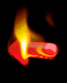 Red arrow-shaped icon with yellow-orange flame effects on black background, animated through showing fire movement