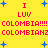 Yellow background with red text and blue starbursts, displaying 'I LUV COLOMBIA!!!' variations in pixelated font.