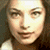 A pixelated image of a person with light skin and brown hair on the left, next to green text reading 'Original Icons .com' on a dark green background.