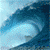 A 4-frame animated contact sheet showing a surfer riding large ocean waves in various positions across the frames.