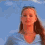 A person with long brown hair and a light blue shirt appears in four sequential poses against a bright blue sky background.