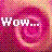 Pixelated pink and purple gradient background with white text reading "Wow..." overlaid on a stylized rose shape.
