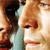 Two stylized figures in close proximity, one with dark hair and light clothing, the other with light hair and a neutral expression, rendered in a pixelated style with warm tones.