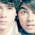 four pixelated face images with varying expressions and cropping, showing subtle changes in mouth position and eye direction