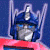 A 50x50 pixel animated buddy icon featuring a Transformers character on the left and green text on the right, displayed as a contact sheet with two frames.