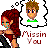 Pixel art of a red-haired woman with blue tears standing next to a thought bubble containing a man with brown hair and green shirt, with 'Missin You' text below.