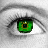 Green-eyed close-up with pixelated heart symbols and text overlays in a