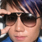 A person with dark sunglasses and purple-streaked hair appears in a of , each showing different purple text overlays