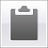Gray clipboard icon with rounded top corners and a small tab at the top center, set against a light gray background with a white inner border.