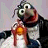 A 2x2 contact sheet of a pixelated animated icon featuring Gonzo the Muppet holding an orange object, with text reading "a love like this should be..." and "illegal" across four quadrants.