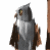 Animated owl with gray and brown feathers, white beard-like chest, orange eyes, turning head left to right across frames.