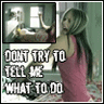 A static image of a woman in a pink sleeveless top standing beside a bed with patterned sheets, text overlay reads "DON'T TRY TO TELL ME WHAT TO DO".