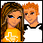 Pixel art buddy icon showing two cartoon characters: a woman with long brown hair in an orange shirt and a man with short red hair in a white-and-black shirt, both facing forward against a plain background.