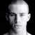 A four- with a grayscale portrait, color scene, text block, and blank space