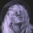 Pixelated grayscale portrait of a person with long hair, neutral expression, and dark background.