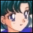Pixelated anime-style character with teal hair and large eyes, next to stylized text on a black background.