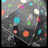 A static pixelated image with a dark central figure against a gray background, surrounded by scattered colored dots in cyan, green, orange, pink, and white.