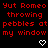Red text reading 'Yut Romeo throwing pebbles at my window' on black background with white heart and arrow symbols changing position across frames.