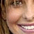six showing a person's face with varying text overlays, including 'SMG' and 'SMG Fan' in white block letters on the left side of each
