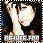 A 48x48 pixel buddy icon split into two sections: a left-side portrait of a person with dark hair and light skin, and a right-side green background with bright green text reading "Original Icons .com".