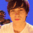 Six distinct pixelated portraits of a young man with brown hair, each in different poses and backgrounds, arranged in a