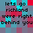 Pixelated text on a of cyan, red, and purple squares with black lettering