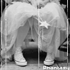 Black-and-white image of a seated figure in flowing fabric holding a star-shaped object, with text below.