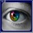 A static pixelated close-up of a human eye with multicolored iris details, framed by dark eyelashes and light skin tones.