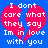 Blue background with two pink broken heart shapes containing white pixelated text reading "I dont care what they say Im in love with you".
