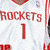 Animated sequence showing a basketball player in a white Rockets jersey with red accents, displaying different poses and text overlays.