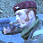 Pixelated figure in purple cap and green jacket holding a white object against blue background