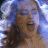 A 48x48 pixel animated buddy icon featuring a contact sheet of two frames showing a woman with curly hair and an open mouth, next to bold red text reading "MOULIN ROUGE!" on a beige background.