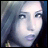Pixelated image of a person with light-colored hair and dark clothing on the left, next to black background with white text reading 'AnimeIM' above 'com'