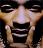 Pixelated static image of a person's face with exaggerated mouth and eyes, likely from an animated GIF or low-resolution source.