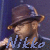 Pixelated static icon of a person wearing a brown fedora hat with a dark band, set against a blue background and featuring the name "Nikko" in stylized light blue text at the bottom.